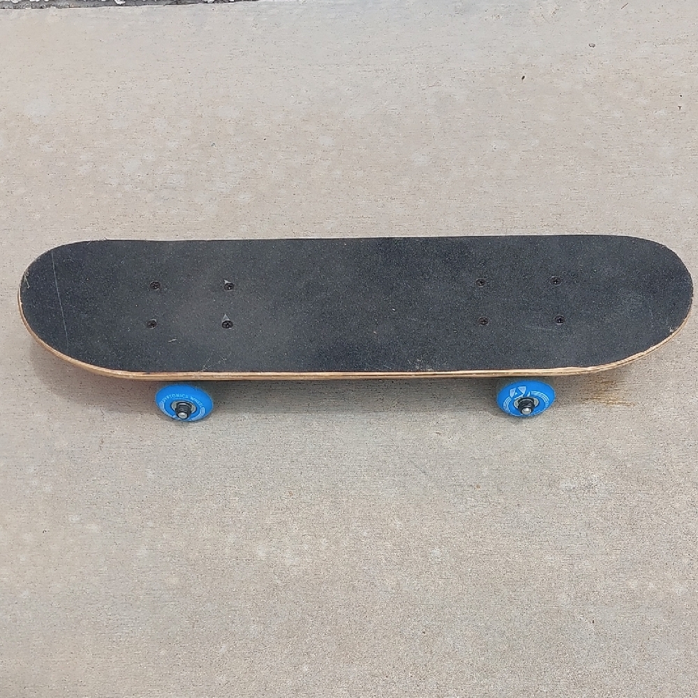 Rocket-pop Themed Child's Skateboard with Kryptonics Blue Wheels